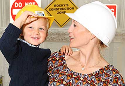 Kelly Rutherford and child